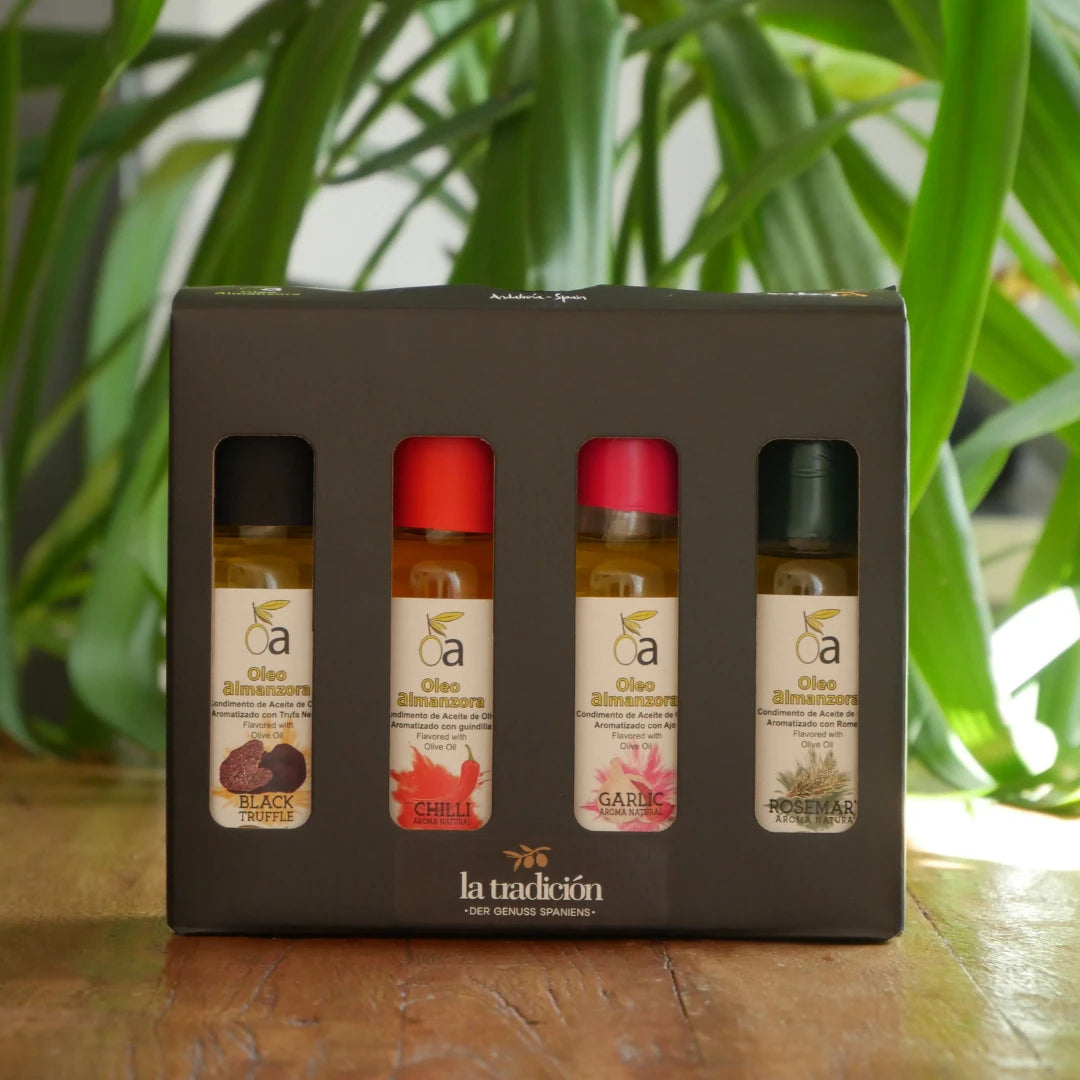 Geschenkbox mit 4 aromatisierten Olivenoelen – schwarzer Trueffel, Chili, Knoblauch und Rosmarin in eleganter Verpackung