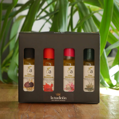 Geschenkbox mit 4 aromatisierten Olivenoelen – schwarzer Trueffel, Chili, Knoblauch und Rosmarin in eleganter Verpackung
