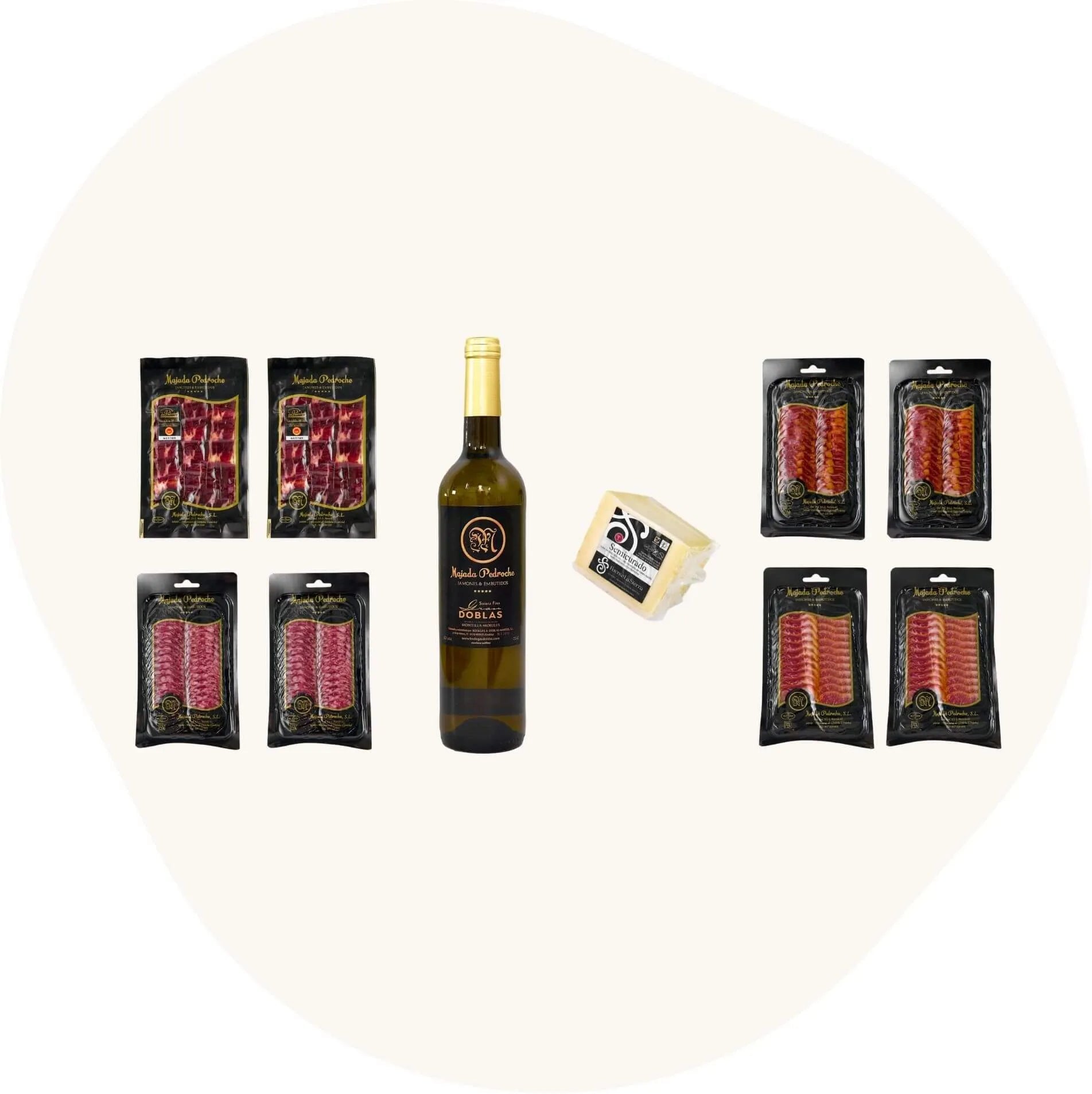 Geschenkset mit acht Aufschnittpackungen Pata Negra Vorderschinken, Chorizo, Salami und Schweinelende, ergänzt durch Manchego-Käse und Weißwein. Hochwertige spanische Feinkost in edler Präsentation.