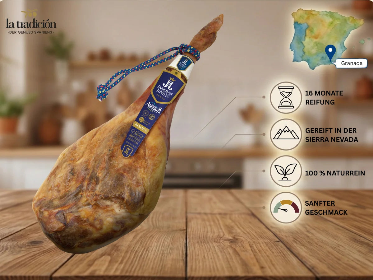 Ganzer Jamón Serrano Reserva aus Granada mit 16 Monaten Reifung, luftgetrocknet in der Sierra Nevada, naturrein mit sanftem Geschmack.