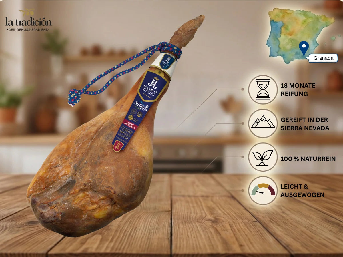 Ganzer Jamón Serrano Reserva aus Granada mit 18 Monaten Reifung, luftgetrocknet in der Sierra Nevada, naturrein und ausgewogen im Geschmack.