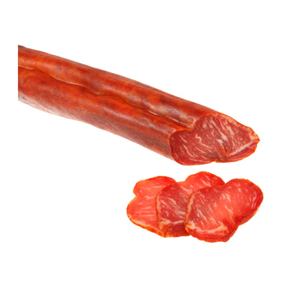 Lomo Ibérico de Bellota als ganzes Stück mit Anschnitt und drei aufgeschnittenen Scheiben, zartes mageres Fleisch mit feiner Marmorierung
