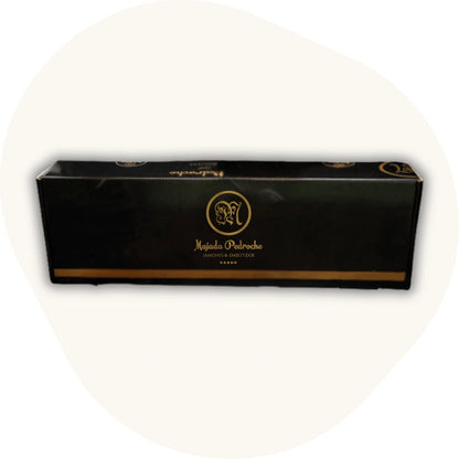 Majada Pedroche Geschenkbox für Jamón – elegante schwarze Verpackung mit goldenen Details, ideal für spanische Schinken und Delikatessen aus Los Pedroches.