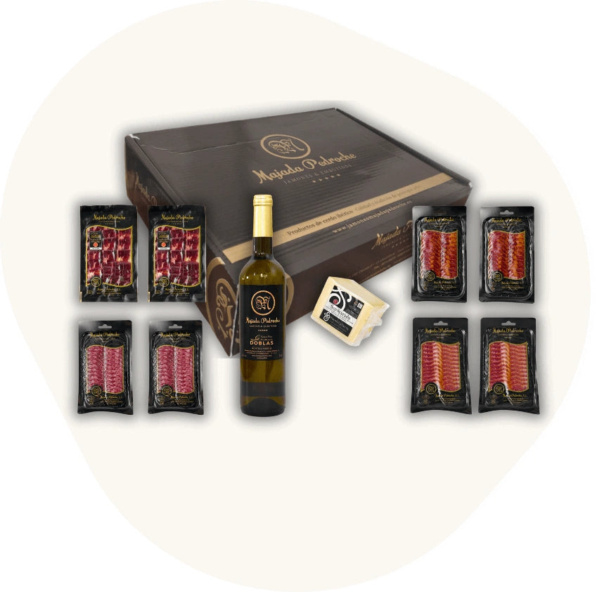 Majada Pedroche Geschenkset mit Ibérico-Schinken, Chorizo, Salchichón, Weißwein und Käse – spanische Delikatessen in eleganter schwarzer Box.