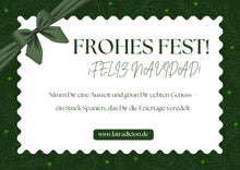 Weihnachtliche Geschenkkarte in Grün mit Schleife und spanischem Genussgruß.