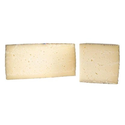 Queso de Mezcla Madurado von Baza – halber und viertel Laib, Schnittbild mit cremefarbener Paste, 6 Monate gereift, aus Kuh- und Schafsmilch, aus Granada