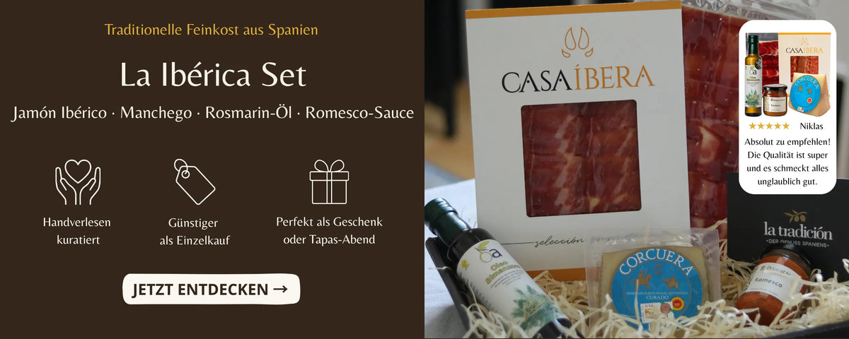 La Iberica Set mit Jamon Iberico Manchego Rosmarin Oel und Romesco Sauce als Geschenkbox