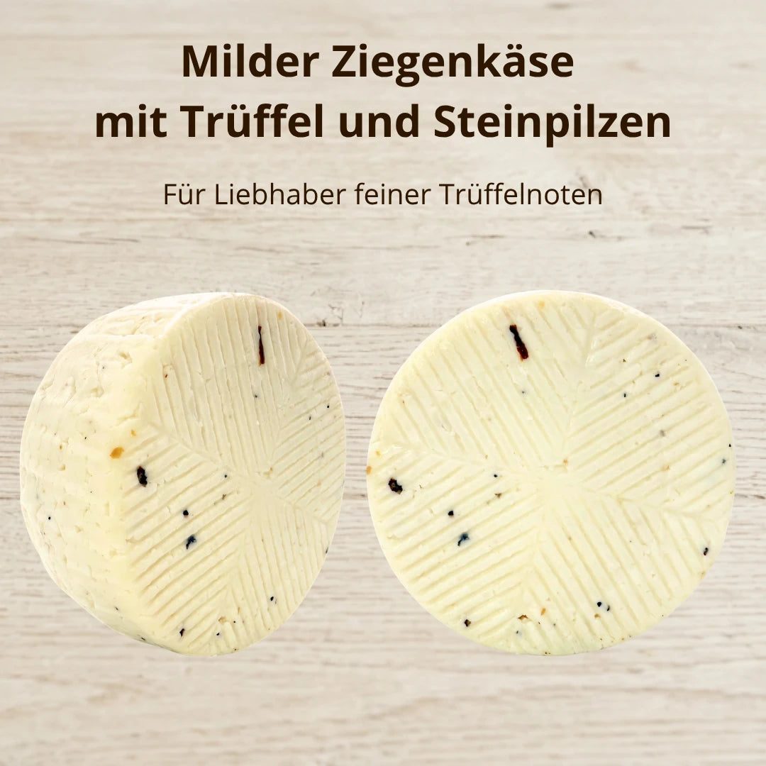 Milder Ziegenkäse mit Trüffel und Steinpilzen: zwei runde Laibe mit sichtbaren Trüffelstückchen und gerilltem Muster auf der Oberfläche, hergestellt von Quesos Corcuera in Toledo – La Tradición