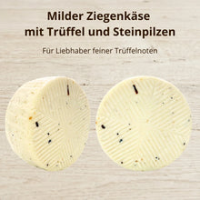 Milder Ziegenkäse mit Trüffel und Steinpilzen: zwei runde Laibe mit sichtbaren Trüffelstückchen und gerilltem Muster auf der Oberfläche, hergestellt von Quesos Corcuera in Toledo – La Tradición